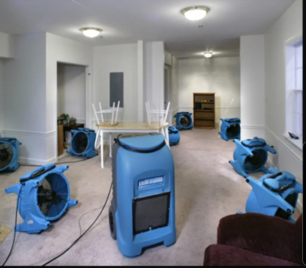 Air movers and dehumidifier setup for Water Extraction & Removal in Tulare